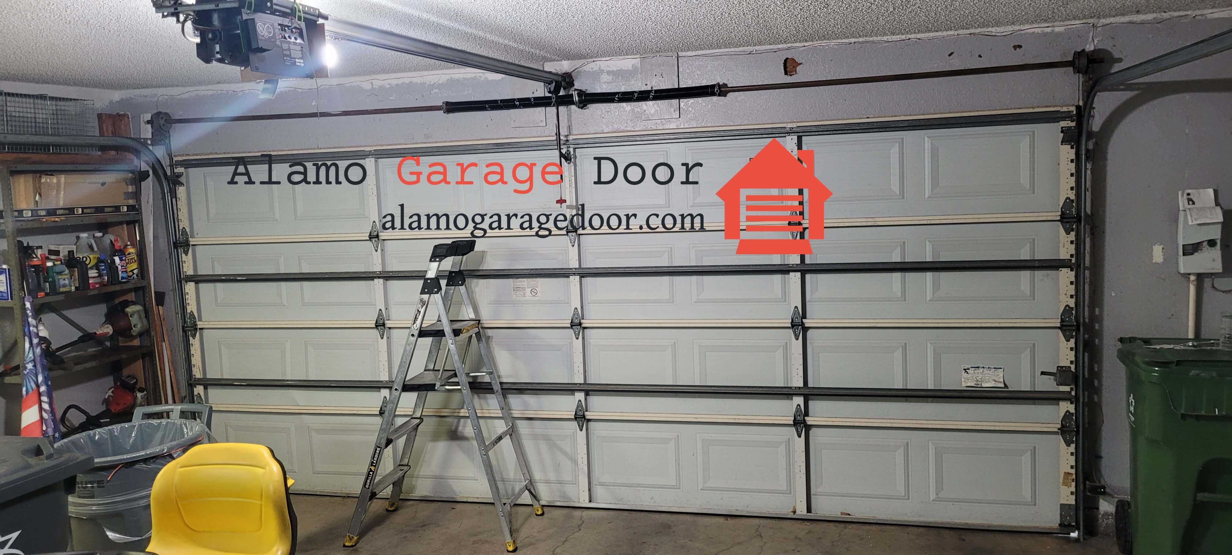 alamogaragedoor.com_garage_door_torsion_spring_replacement